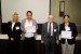 Prof. Suzanne Lunsford and Dr. Nagib Callaos giving Dr. Narcisa Medranda Morales and Dr. Victoria D. Palacios the best paper award certificate of the session "Educación, Cibernética e Informática II." The title of the awarded paper is "La Cibernética y el Periodismo en la Construcción de Herramientas para la Auditoría Cívica."